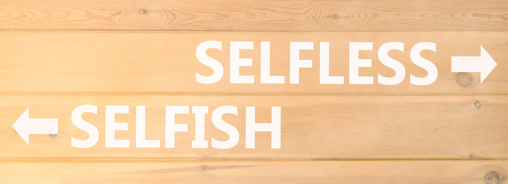 Selfless instead selfish words symbol. Concept words Selfless Selfish on beautiful wooden wall. Beautiful wooden wall background. Business medical psychology selfless selfish concept. Copy space.