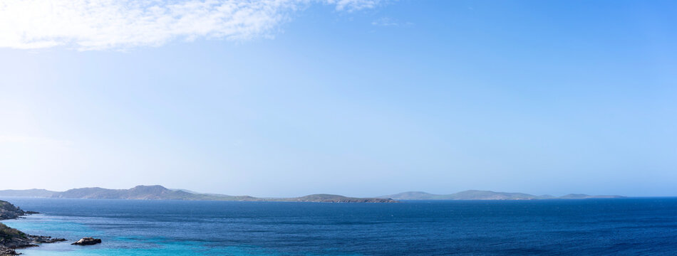 Delos seen from Mykonos on a sunny winter day