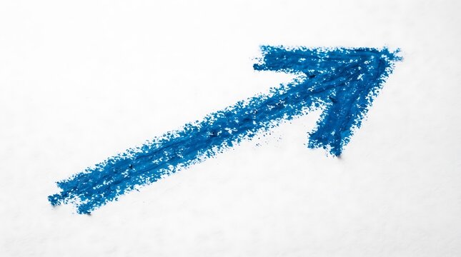 Blue crayon drawing of an arrow pointing to the right on a white surface representing direction and progress