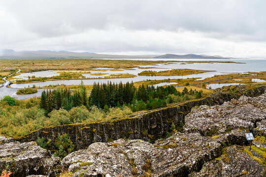 Scenic volcanic landscape with river islands and forest