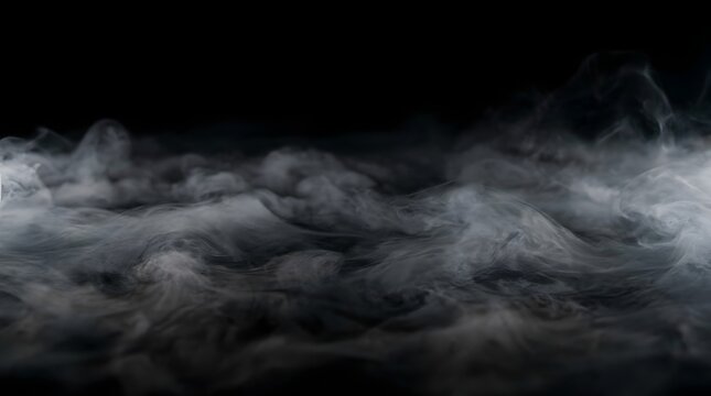 A dark and mysterious halloween background featuring thick rolling fog on the ground perfect for creating a spooky atmosphere for your festive holiday graphic design