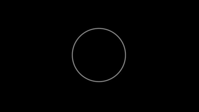 Minimalist glowing ring light flashing on black background creating pulse effect for modern technology designs.