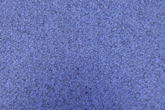 vista macro di superficie di moquette color blu-viola