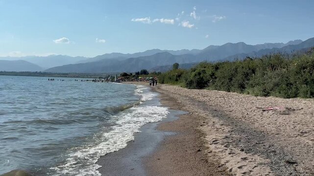 Shore of the Issyk Kul lake on sunny day Kyrgyzstan
