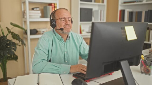 Middle age hispanic man with headset at computer desk crosses arms and smiles in a home office building; calm professionalism.