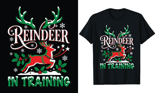 Reindeer In Training Christmas T-Shirt Design &ndash; Festive Holiday Quote with Leaping Reindeer, Big Antlers & Holly Leaves Tee