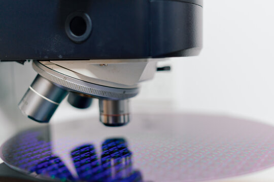 Close Look at Microscope With a Glass Slide in a Laboratory Setting