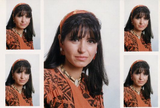 Woman posing for identity passport document portrait