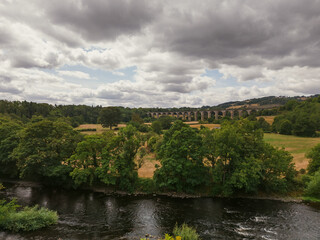 Fototapeta premium Lush Green River Landscape Near Pontcysyllte Aqueduct, Wales
