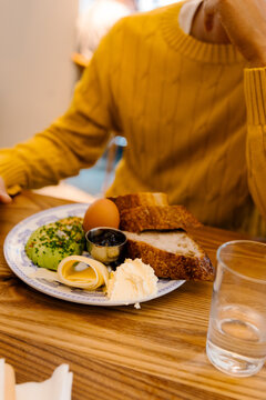 Unidentified man ready to eat a traditional Danish breakfast