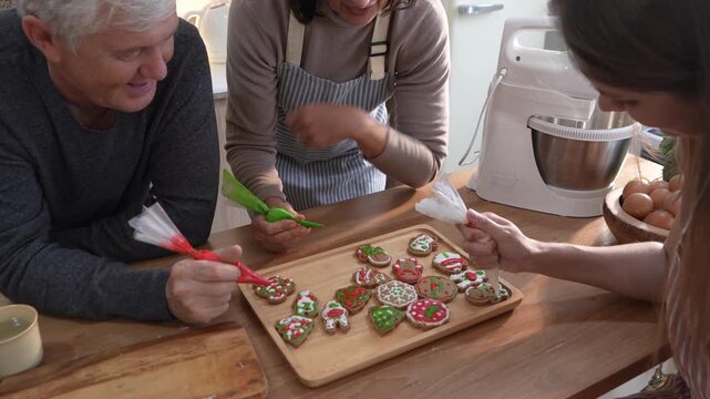 The family&mdash;parents and daughter&mdash;did activities together, decorating gingerbread cookies with cream cheese and preparing food for a Thanksgiving and Christmas party at home.