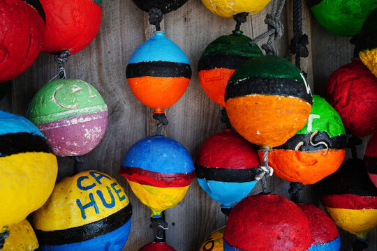Colorful painted buoys at the marina in Key West, Florida