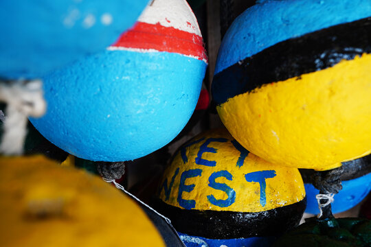 Colorful painted buoys at the marina in Key West, Florida
