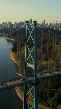 Aerial view of Lions Gate Bridge and Stanley Park at dawn. Canada