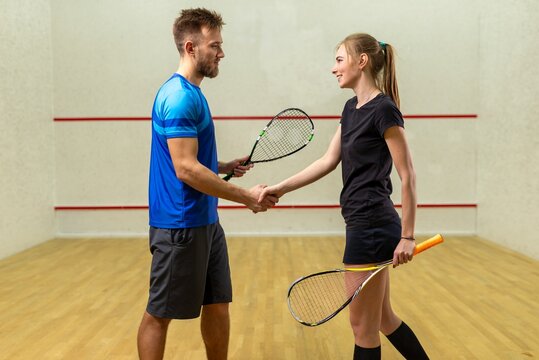 Squash players shaking hands before the match