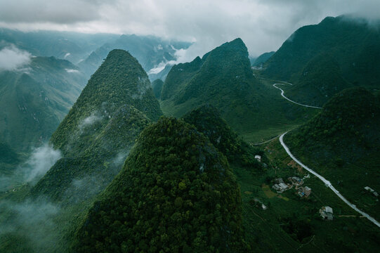 Aerial View of Misty Karst Mountains in Ha Giang Vietnam