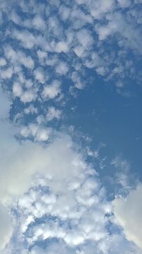 Fluffy Altocumulus Clouds and Bright Blue Sky on a Sunny Day