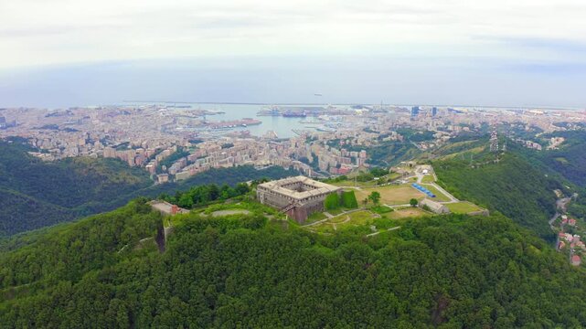 Genoa, Italy. Forte Begato, a 19th-century quadrangular fortress with angular bastions and broad embankments, Drone footage over the Polcevera valley and Ligurian Sea. Drone footage, Point of interes