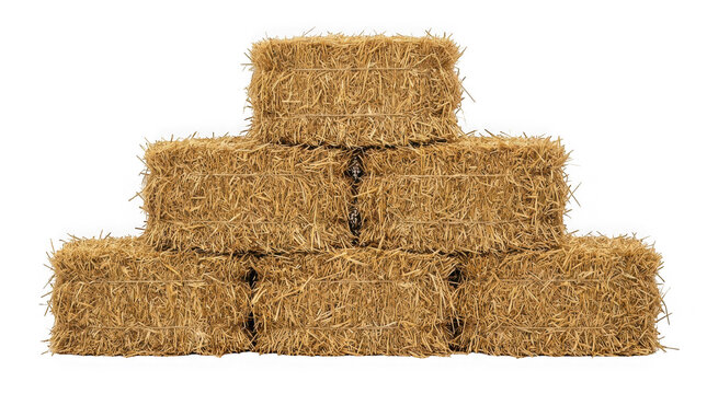 Stack of rectangular straw hay bales isolated on transparent background