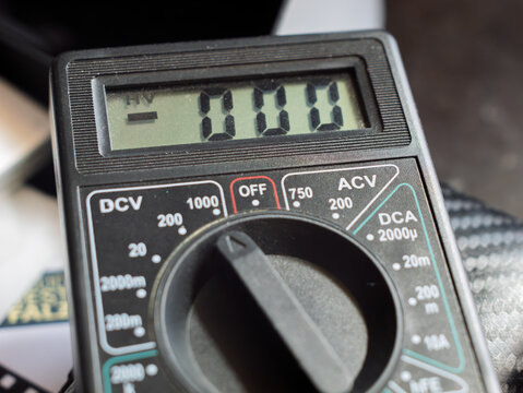 Digital Multimeter Displaying Voltage Measurement for Electrical Testing