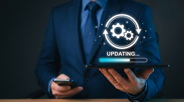 Businessman holding tablet with software update progress and loading process
