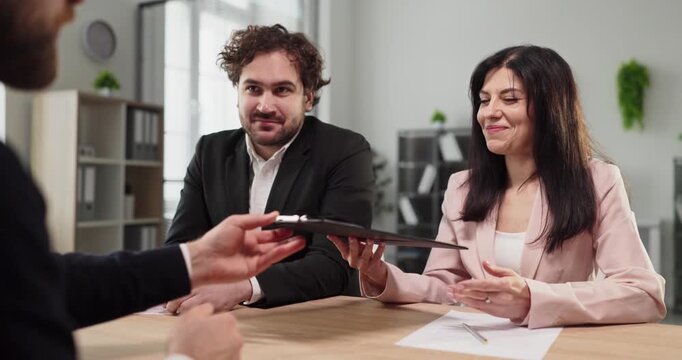 Interview recruiter candidate hr meeting in office. Recruiters review a resume and discuss the role, asking hiring questions to gauge experience and fit. Team hiring and evaluation concept.