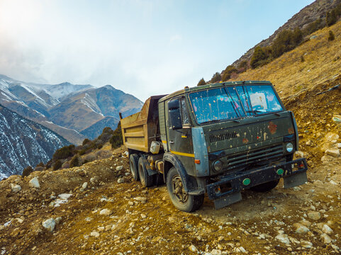 Dump Truck on Rocky Mountain Road in Kyrgyzstan