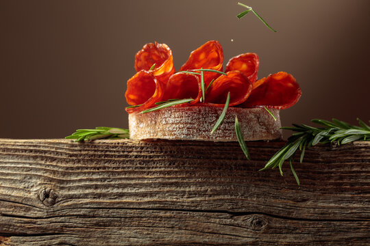 Sandwich with thin slices chorizo sausages.