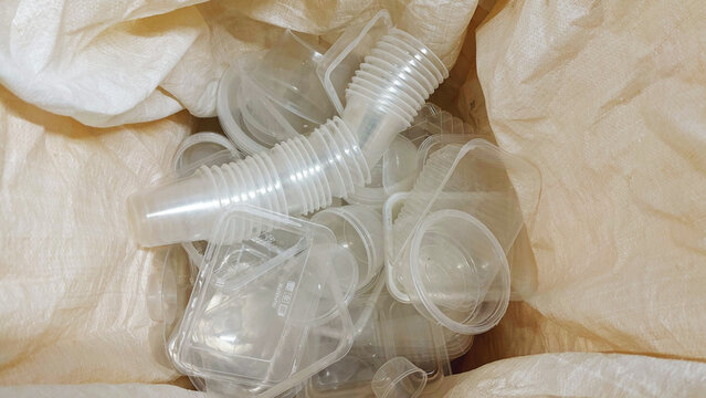 Recycling bag filled with clear polypropylene waste