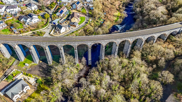 A view directly above the curved Cefn Coed Viaduct at Merthyr Tydfil, Wales on a sunny day