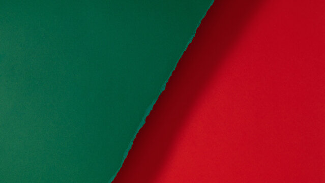 Christmas Torn Paper Background. Ripped Dark Green Paper Over Red Cardboard Sheet with Shadow. Minimalist Festive Winter Holiday Abstract Geometric Layered Backdrop Layout with Copy Space