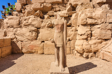 Fototapeta premium Karnak Temple Complex in Luxor – Ancient Egyptian Columns, Hieroglyphs and historic landmark, Egypt