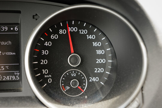 Speedometer in car at 90 km per hour. Close-up of tachometer when driving fast in Germany. Gauge in dashboard displaying the travel speed.