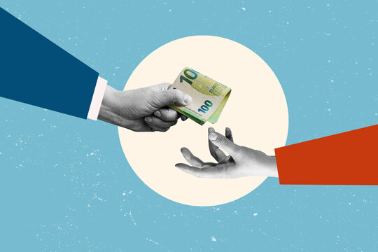 A hand holding a stack of euro banknotes and passing them on. Buying and paying concept.