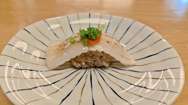 Aburi engawa sushi piece with ebiko shrimp egg garnish, Japanese Food, Premium Raw Seafood, Omakase Restaurant, Gourmet Fine Dining, Fresh Fish Cut, Rotating Shot