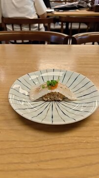 Aburi engawa sushi piece with ebiko shrimp egg garnish, Japanese Food Cuisine, Premium Raw Seafood, Omakase Restaurant, Gourmet Fine Dining, Fresh Fish Cut, Rotating Shot