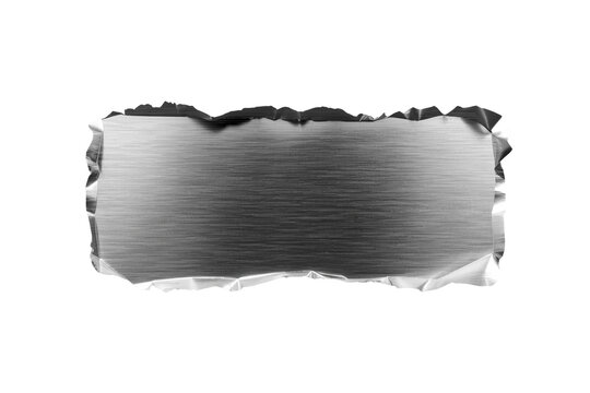 Torn silver brushed metal strip with jagged edges