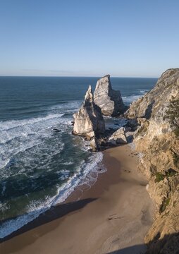 Aerial view, marked rocks at Praia da Ursa beach, Ulgueira, Portugal
