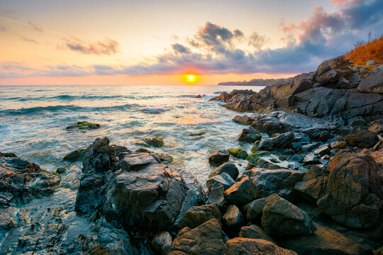 sea landscape at sunrise. rocky coast of bulgaria in summer. dramatic travel background with epic sky