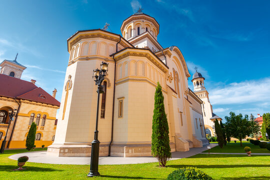 alba iulia, romania - 13 oct 2019: coronation cathedral. holy trinity romanian orthodox cathedral located in alba iulia citadel. sunny autumn day. popular travel destination in europe