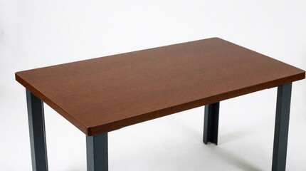 Fototapeta premium Minimalist rectangular brown table with dark metal legs. Simple furniture piece isolated on a clean white background for use in various settings. Versatile item for home or office.