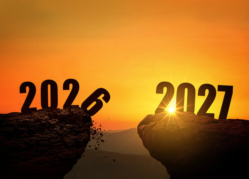 Silhouette of 2026 falling off a cliff and 2027 standing on the opposite mountain peak at bright sunset. Concept of New Year transition, overcoming past challenges, hope, and future goals.