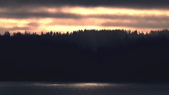 Cinematic 4K Puget Sound at Sunrise with forest and Hills