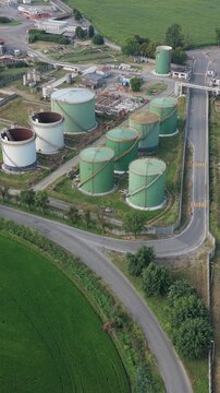 Oil Storage Terminal with Large Petroleum Tanks and Fuel Infrastructure, Aerial Drone View, Italy