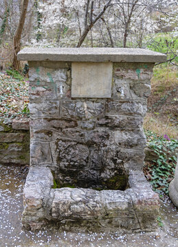 Double Tap Faucet Drinking Water Fountain Stone Base at Park in East Serbia Spring Day