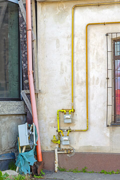 Yellow Pipes Valves and Meter for Natural Gas Supply to House in Craiova Romania