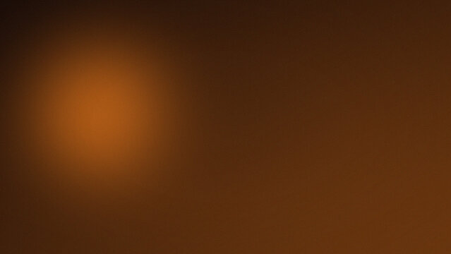 Abstract blurred orange bokeh circle background with soft warm brown gradient lighting effect