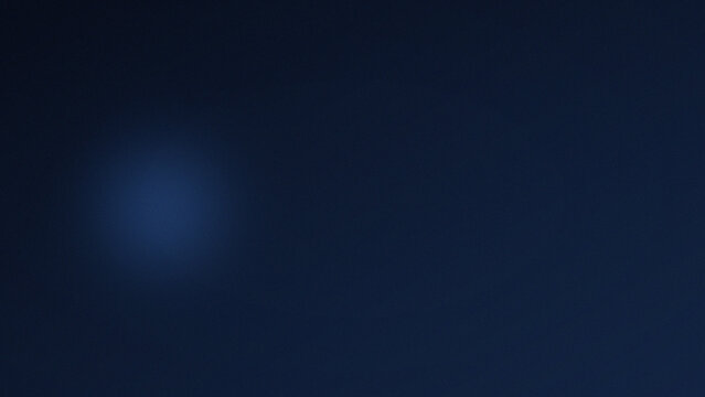 Abstract blurred glowing cyan light orb on dark blue gradient background bokeh effect digital noise minimal design concept