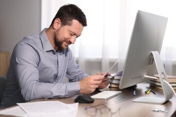 Fototapeta premium Writer working on his book in office