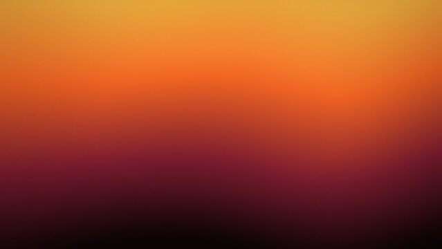 Abstract warm orange and purple gradient background with soft bokeh blur effect suitable for creative design projects.